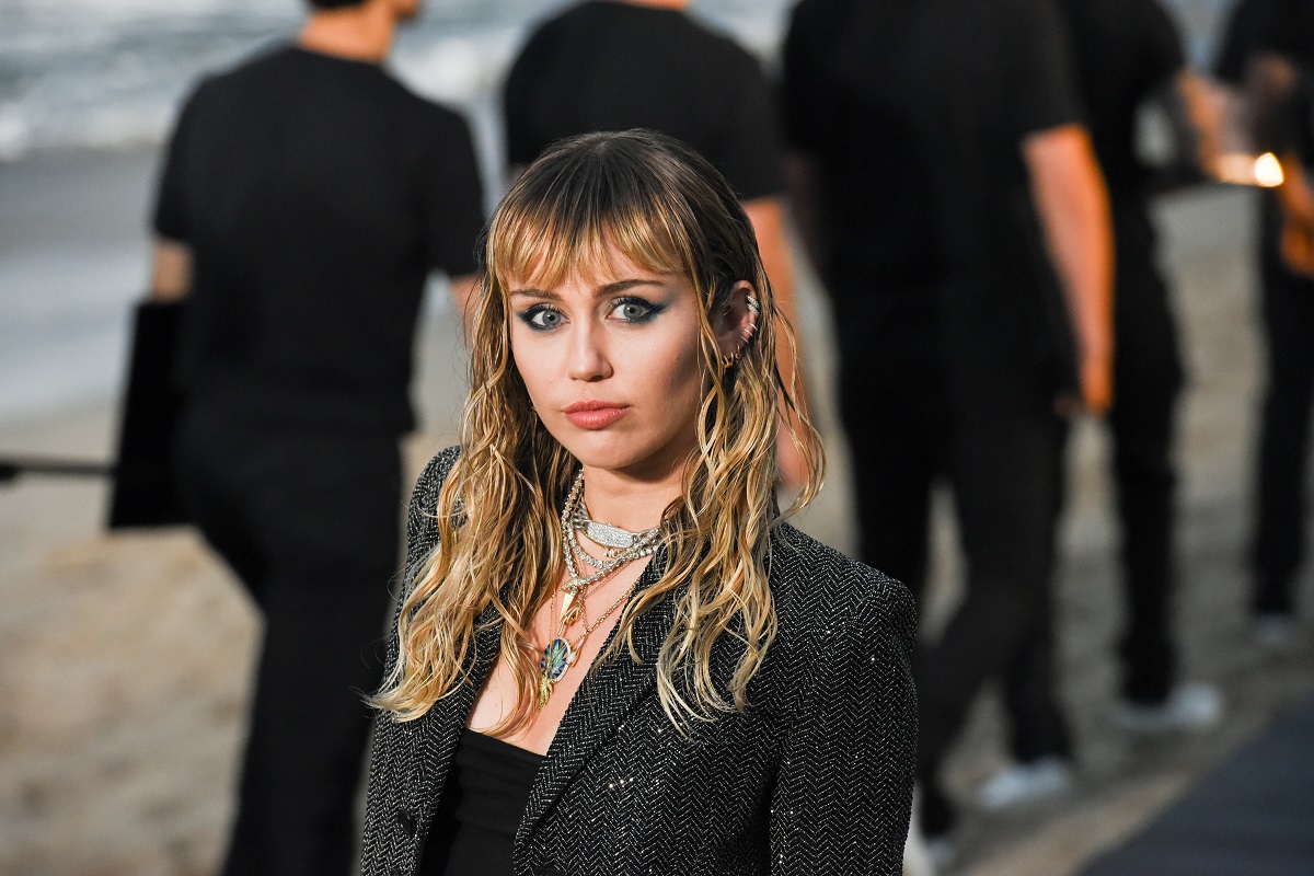 Miley Cyrus poses for cameras in a black outfit on June 06, 2019, in Malibu, California.