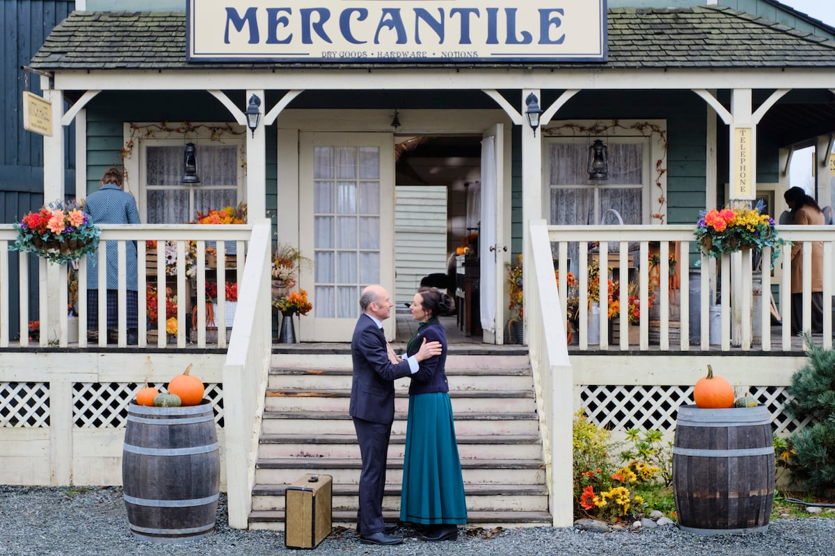 Ned and Florence outside the mercantile in When Calls the Heart