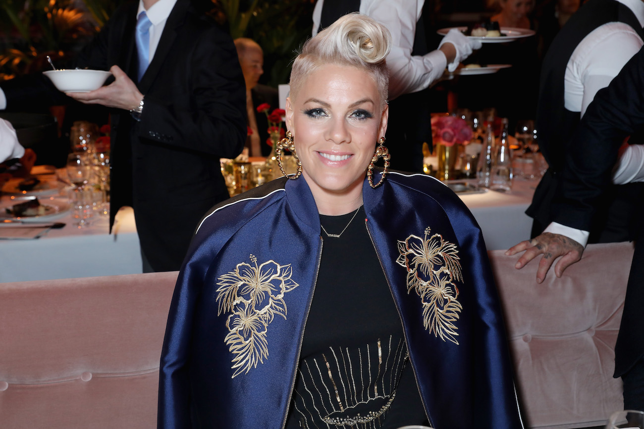 Pink seated at a VIP dinner