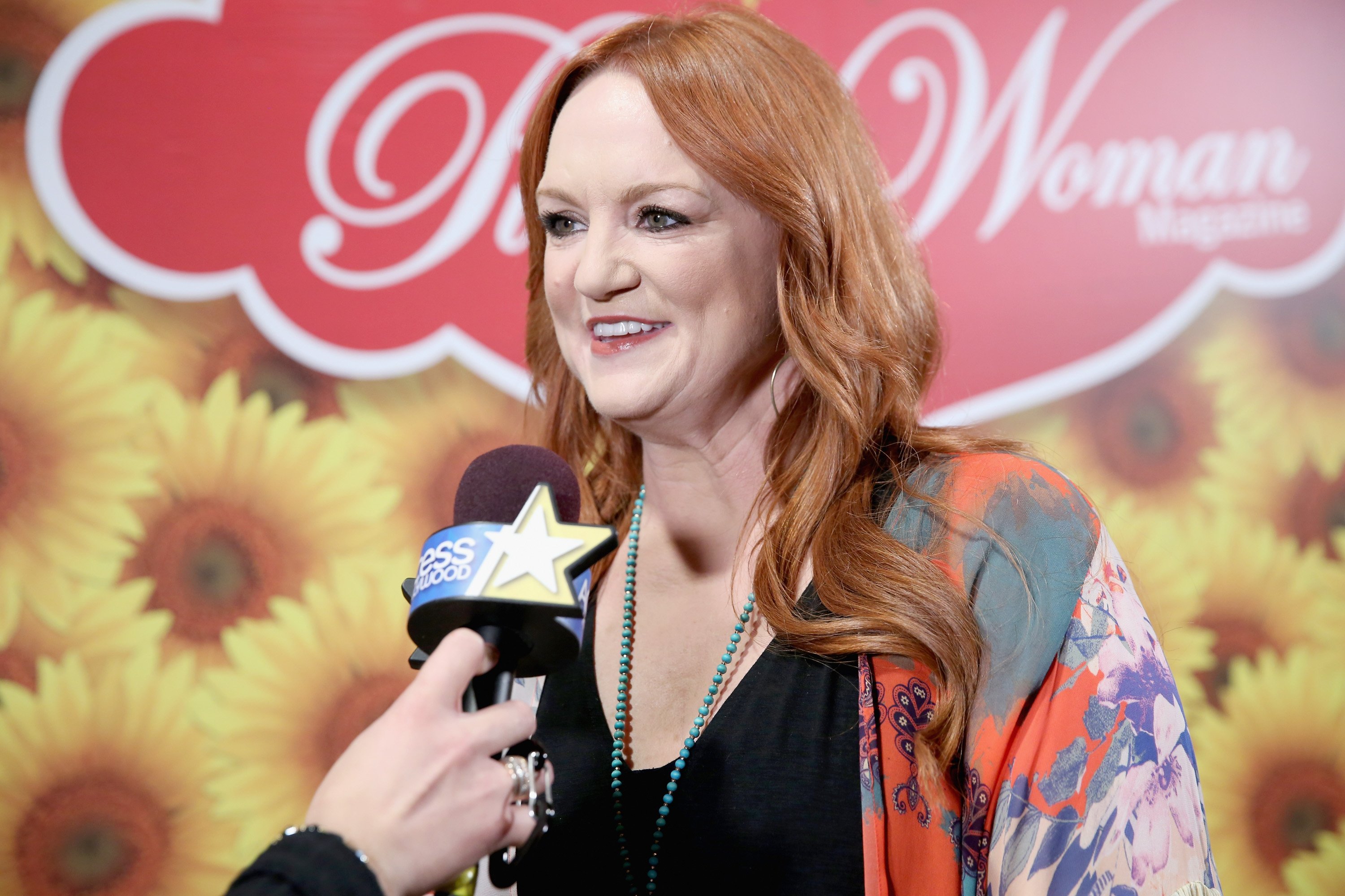 Ree Drummond speaks into a microphone while being interviewed at The Pioneer Woman Magazine Celebration in 2017