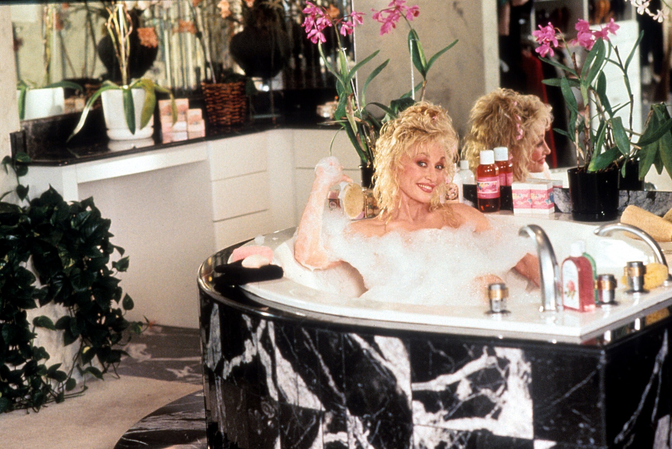 Dolly Parton in the bath in 'Straight Talk.'