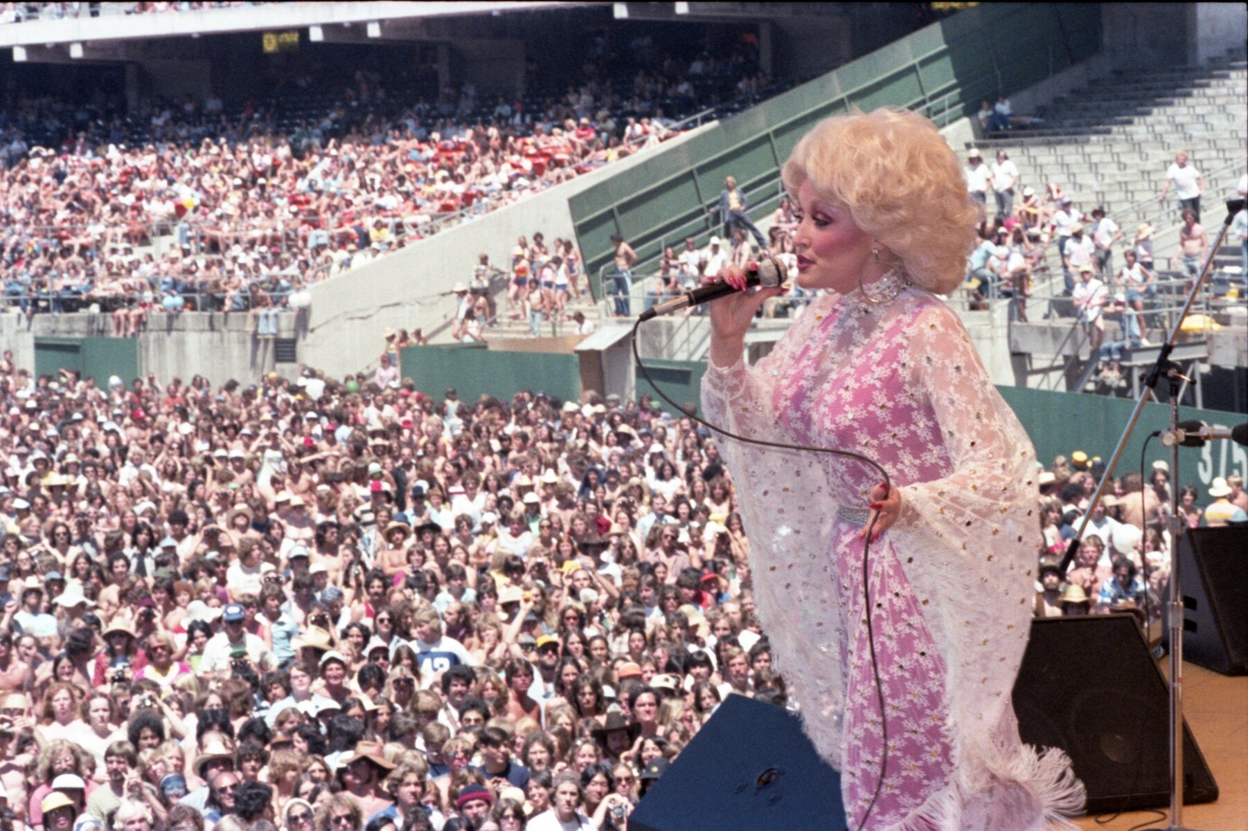 Dolly Parton performing onstage at Day on the Green concert at Oakland Coliseum on May 28, 1978 in Oakland, California.
