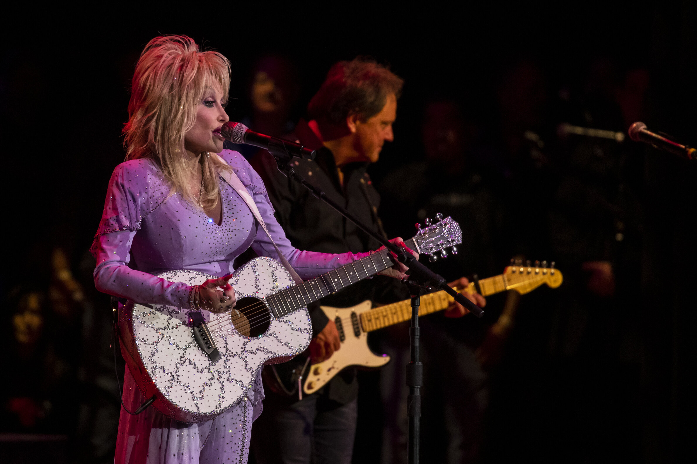 Dolly Parton performing on state at The Gift Of Music Concert