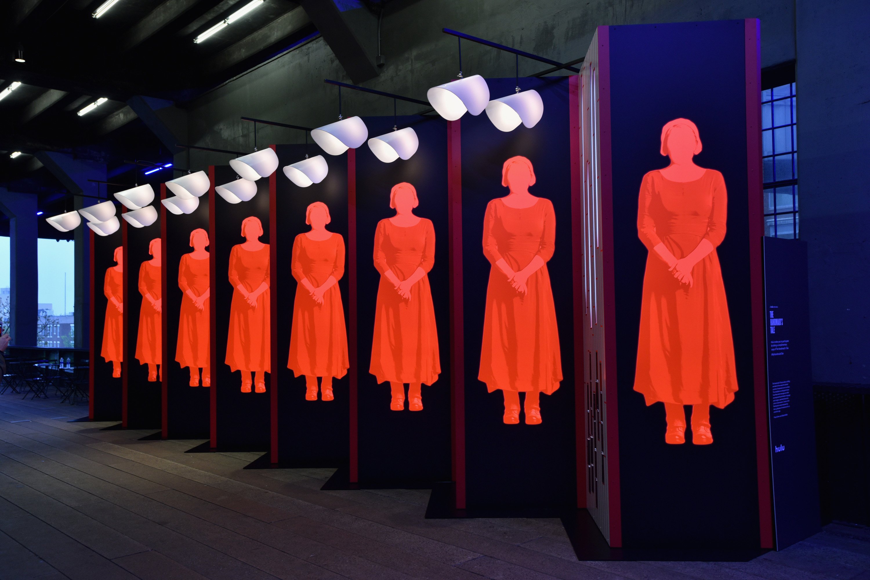 Art inspired by The Handmaid's Tale depicting handmaids