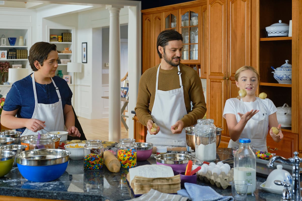 Tyler Hynes in the kitchen with two kids in Sweet Carolina