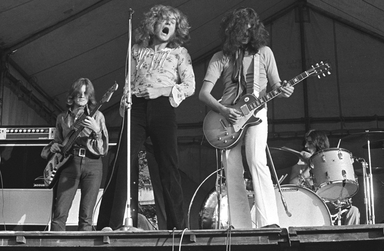 Led Zeppelin performing on an outdoor stage, 1969