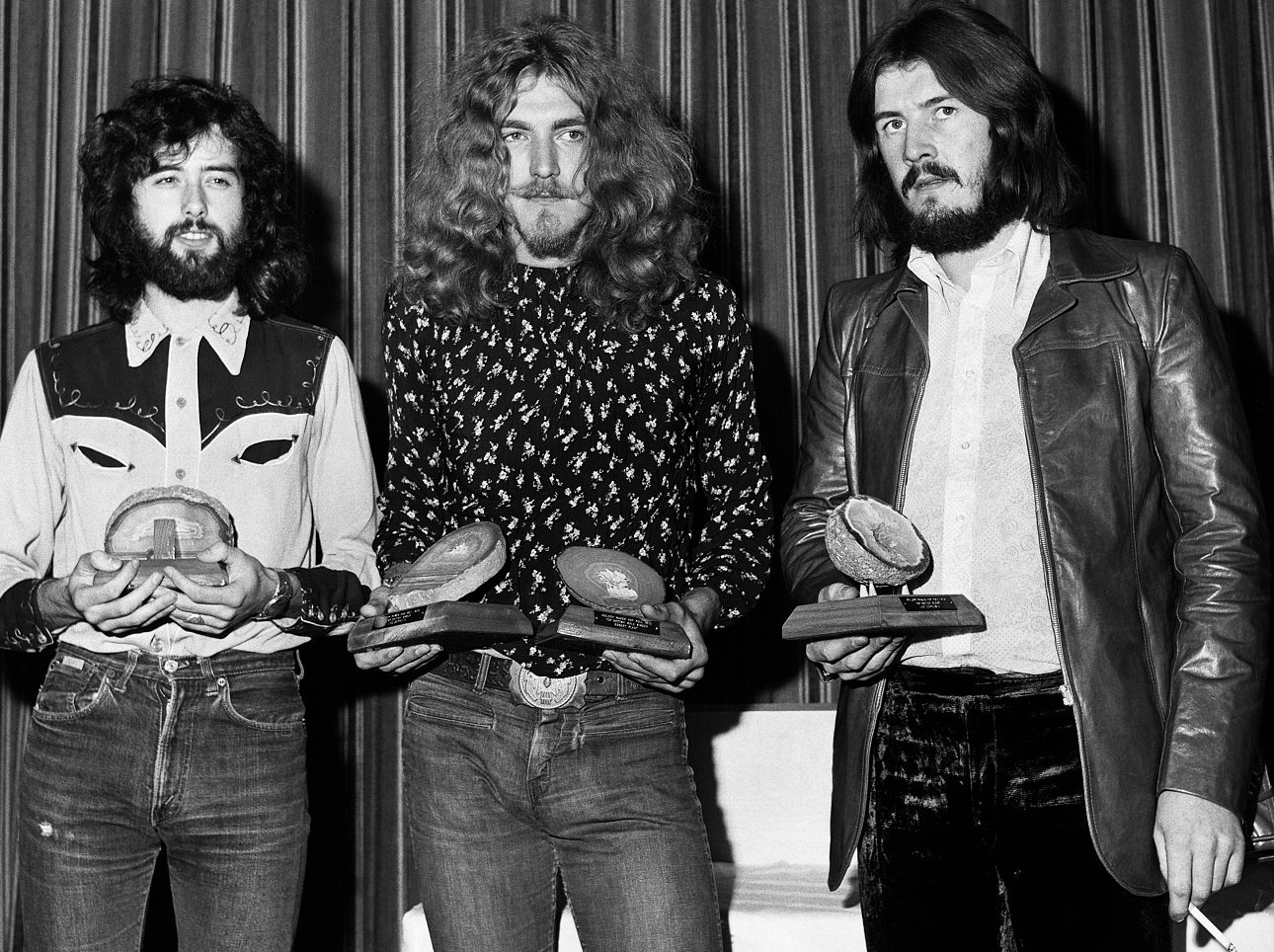 Led Zeppelin band members pose with 1970 Melody Maker poll awards
