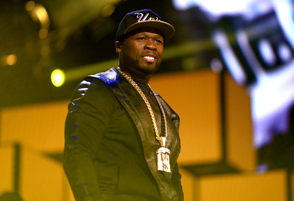 50 Cent performing on stage.