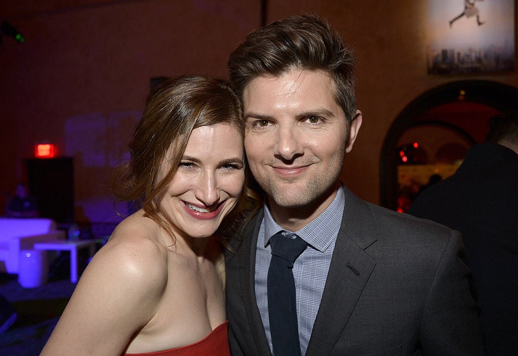 Kathryn Hahn and Adam Scott pose together at the premiere of 'The Secret Life of Walter Mitty'.