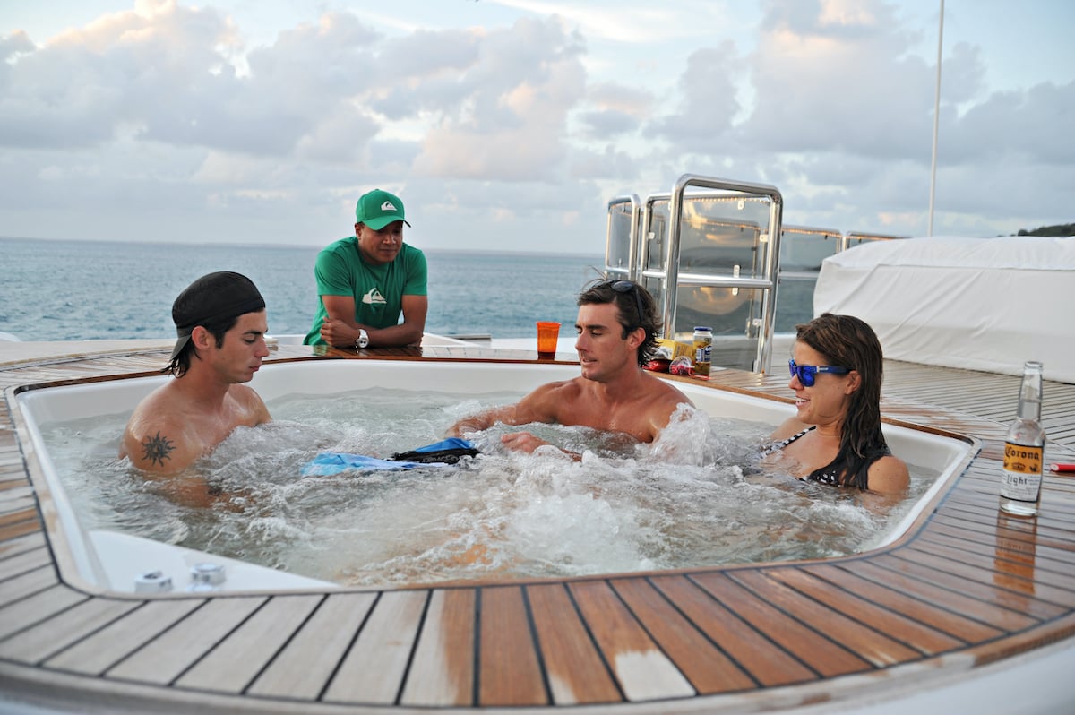 Below Deck Season 1 crew David Bradberry, Crew Member, C.J. Lebeau, Samantha Orme hang out on a day off from charter