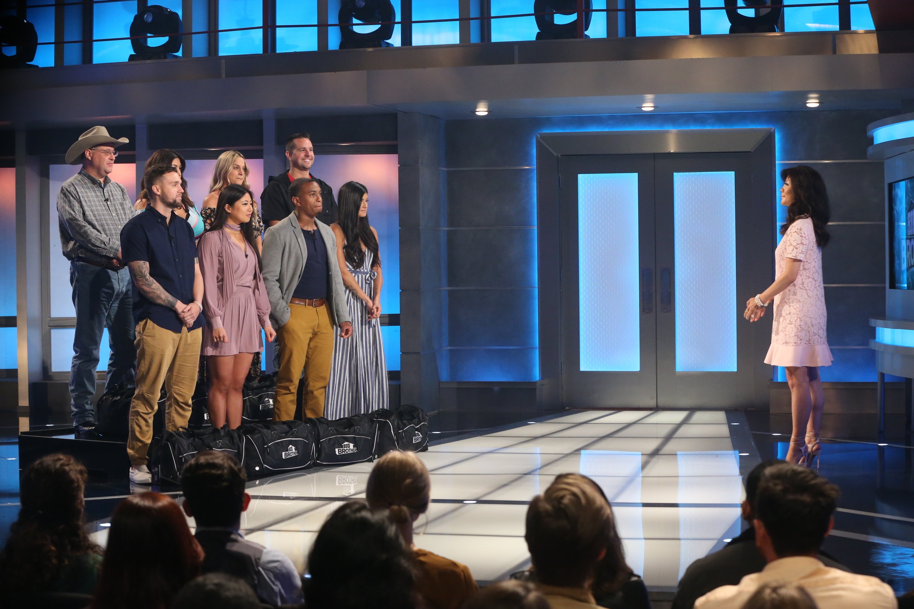 Host Julie Chen Moonves with houseguests: L-R bottom row: Nick Macaroni, Isabella Wang, David Alexander, Analyse Talvera; L_R top row: Cliff Hogg, Jessica Milagros, Christie Murphy, Sam Smith on Big Brother 21's two-night premiere event