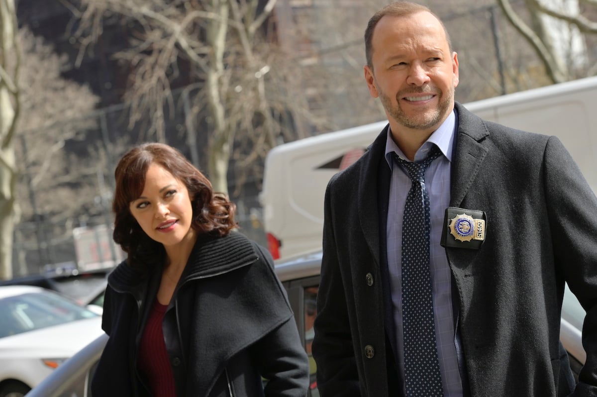 Maria Baez (Marisa Ramirez) looks at Danny Reagan (Donnie Wahlberg) as they stand on the street in 'Blue Bloods'