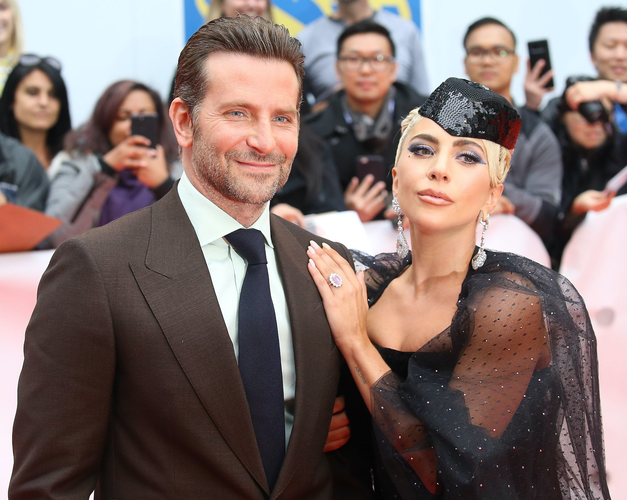 Bradley Cooper and Lady Gaga smiling