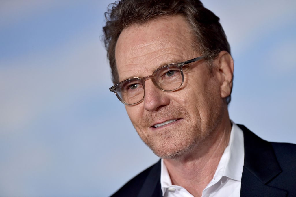 Bryan Cranston wears glasses while walking the red carpet at the premiere for 'El Camino'.