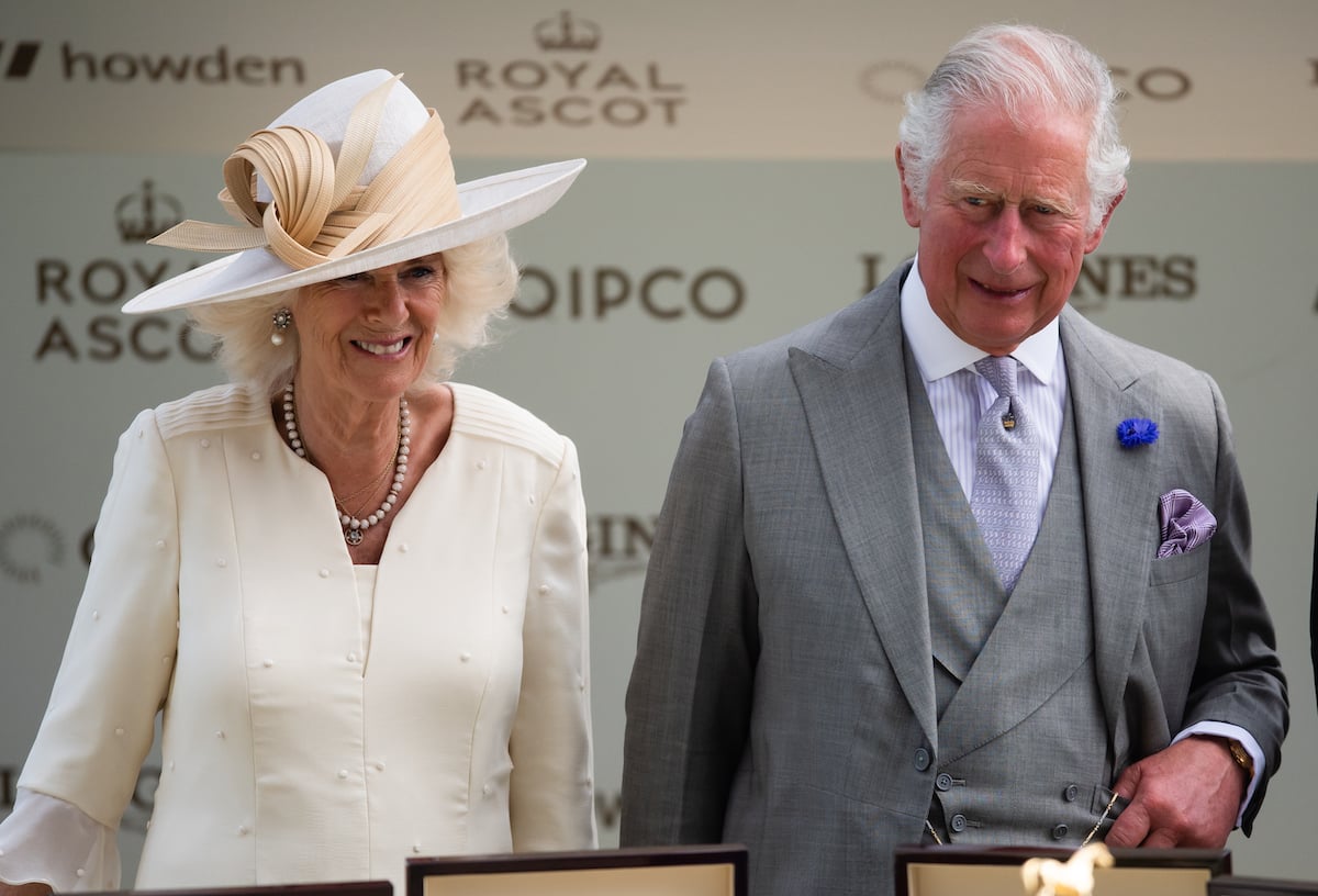 Camilla Parker Bowles and Prince Charles smile as they arrive at Royal Ascot 2021