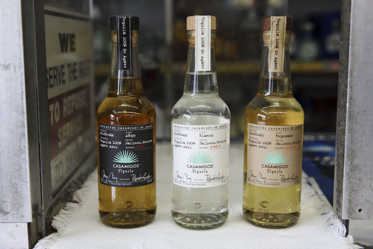 Bottles of Casamigos añejo, blanco, and reposado tequilas