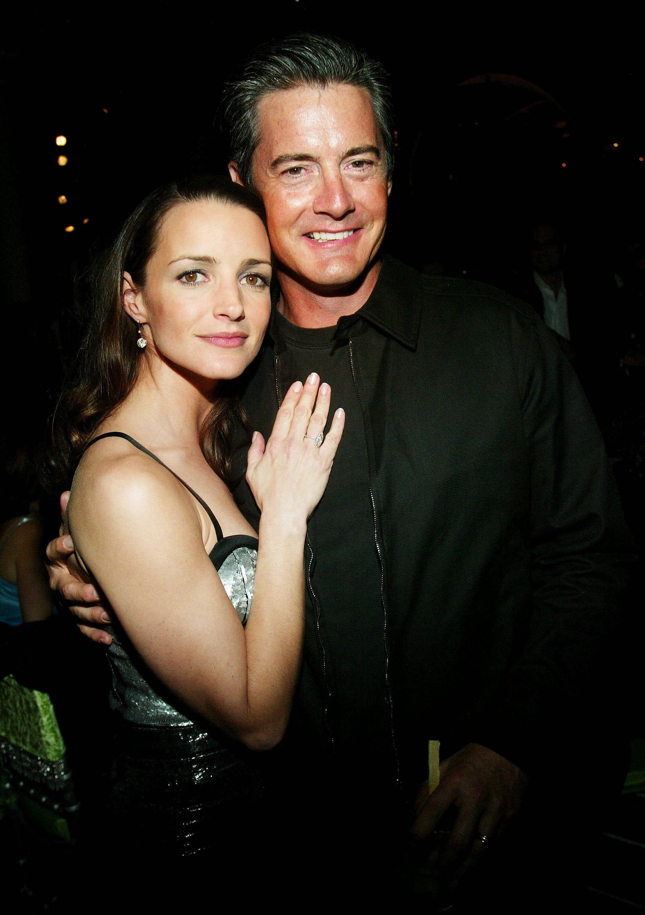 Kristin Davis poses for a picture with Kyle MacLachlan at the premiere of 'Sex and the CIty' in 2003