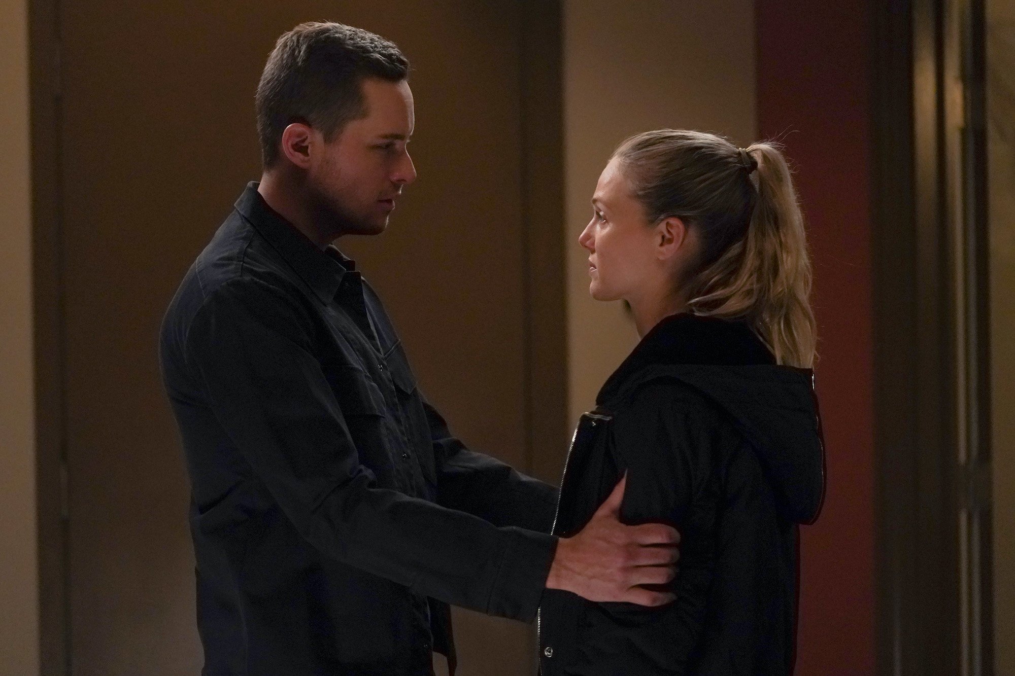 Jesse Lee Soffer and Tracy Spiridakos facing each other on 'Chicago P.D.'