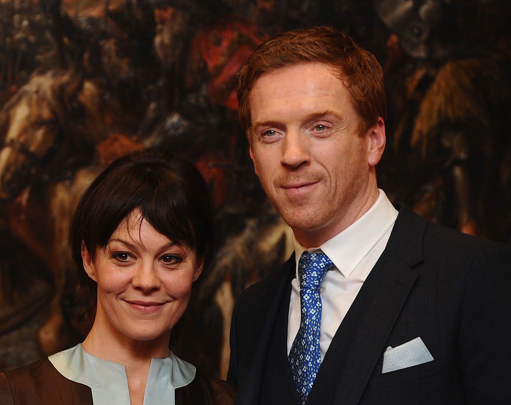 Damian Lewis and Helen McCroy pose together with smiles during Lewis' award ceremony.