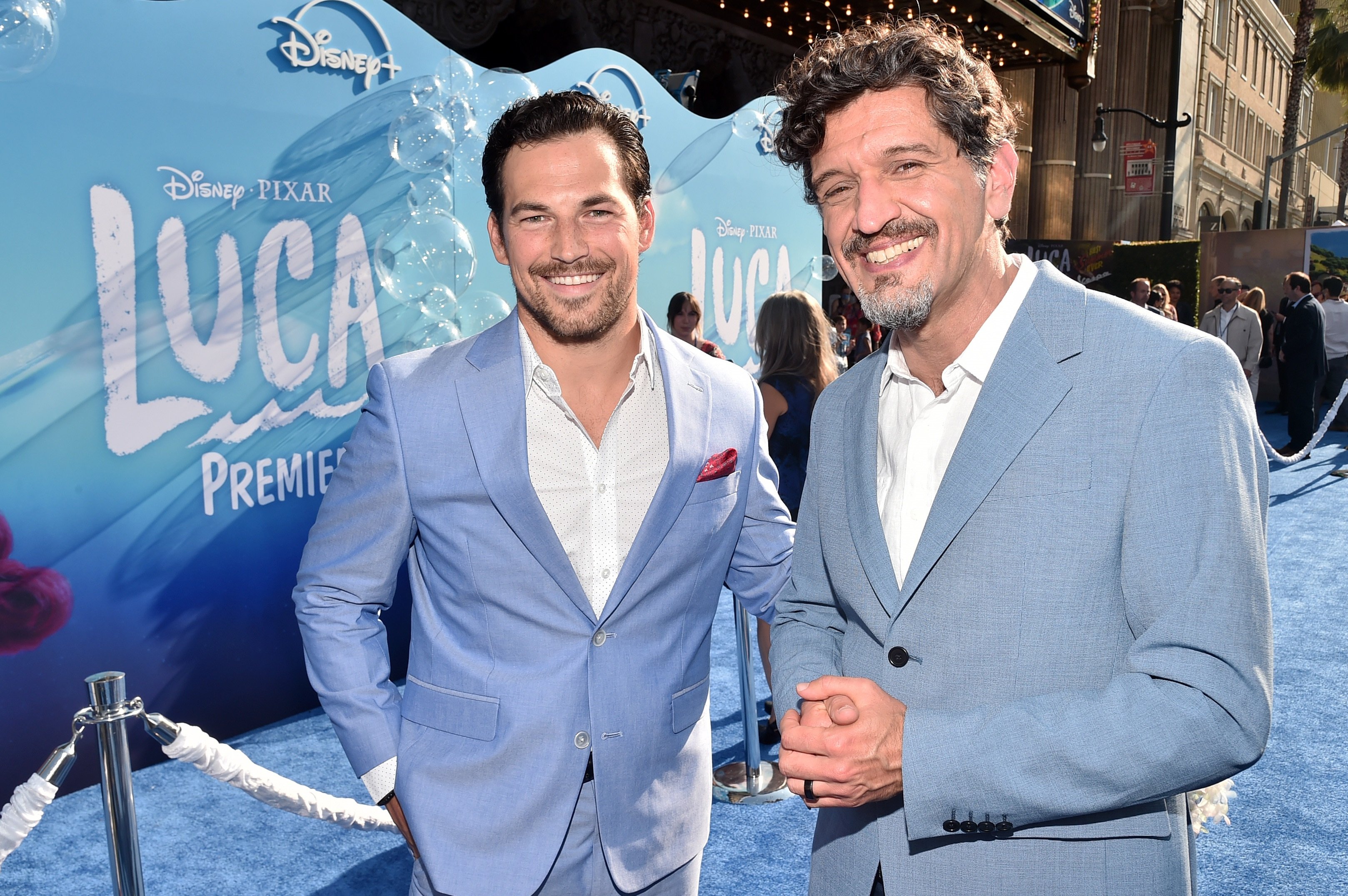 Disney Pixar film Luca with Giacomo Gianniotti and director Enrico Casarosa posing at the world premiere