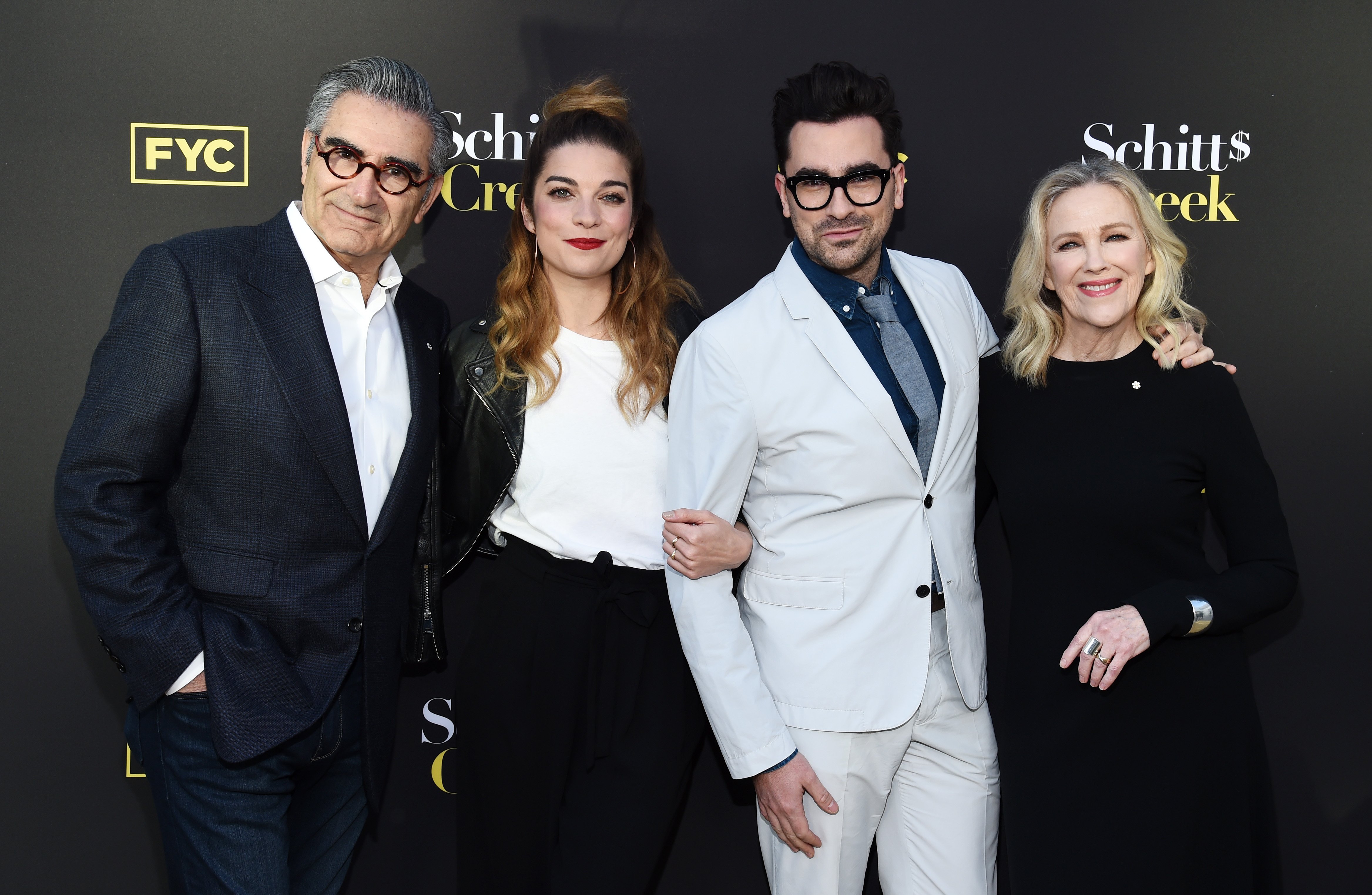 Schitt's Creek cast members Eugene Levy, Annie Murphy, Dan Levy, and Catherine O'Hara pose at a screening