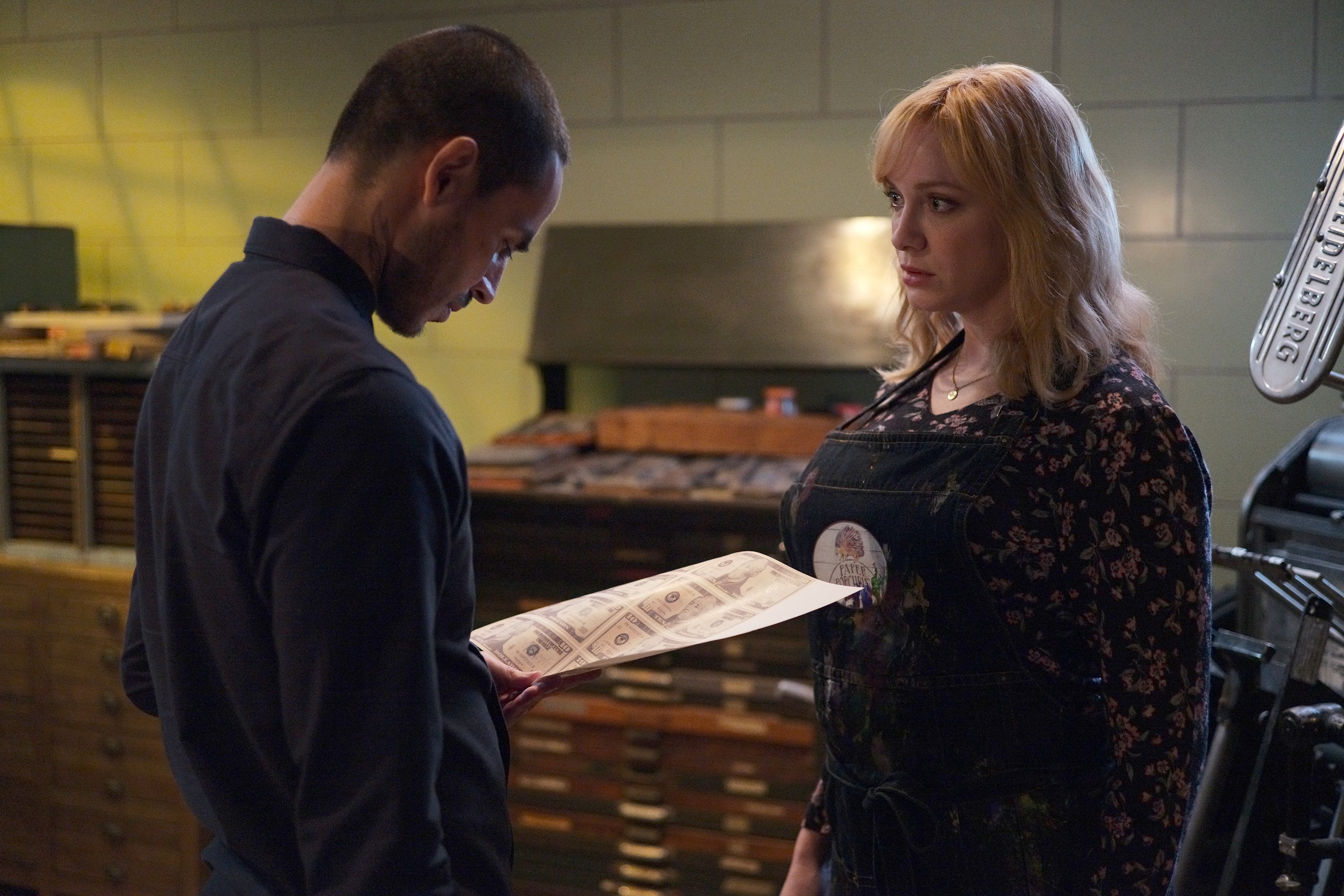 Manny Montana as Rio and Christina Hendricks as Beth Boland on the set of 'Good Girls'