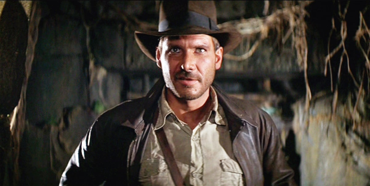 Harrison Ford as Indiana Jones wears his signature brown jacket and fedora in a scene from 'Raiders of the Lost Ark'