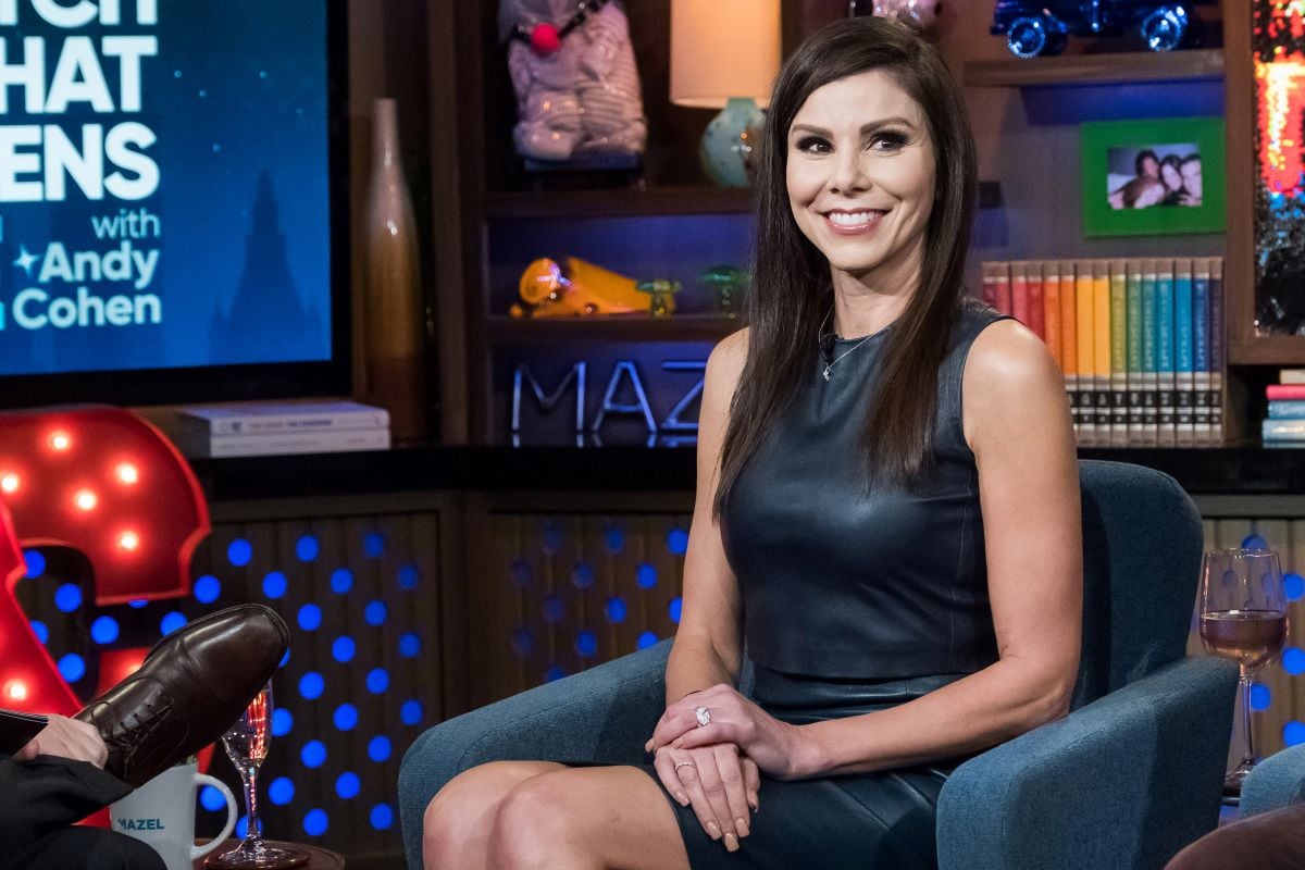 'RHOC' cast member Heather Dubrow sitting in black dress on 'Watch What Happens Live'