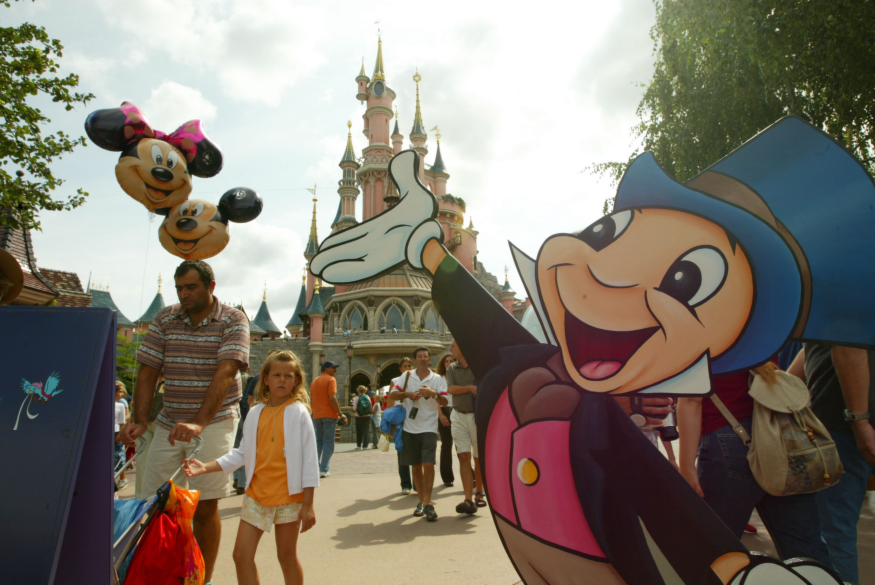 Jiminy Cricket welcomes visitors to Fantasyland in Disneyland Paris
