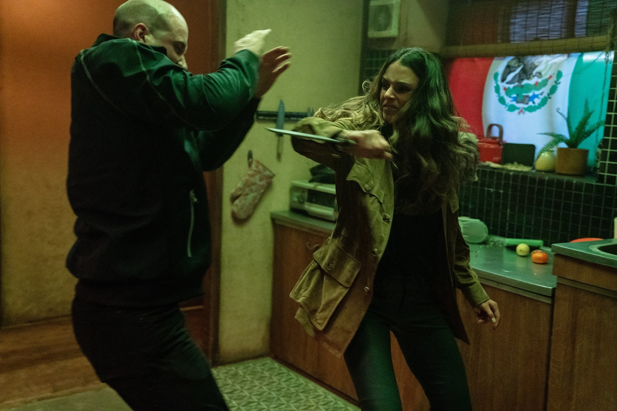 Jordana Brewster fights a bad guy in F9