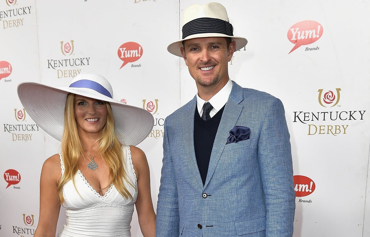 Kate Rose and Justin Rose pose for photo on red carpet at the 143rd Kentucky Derby at Churchill Downs