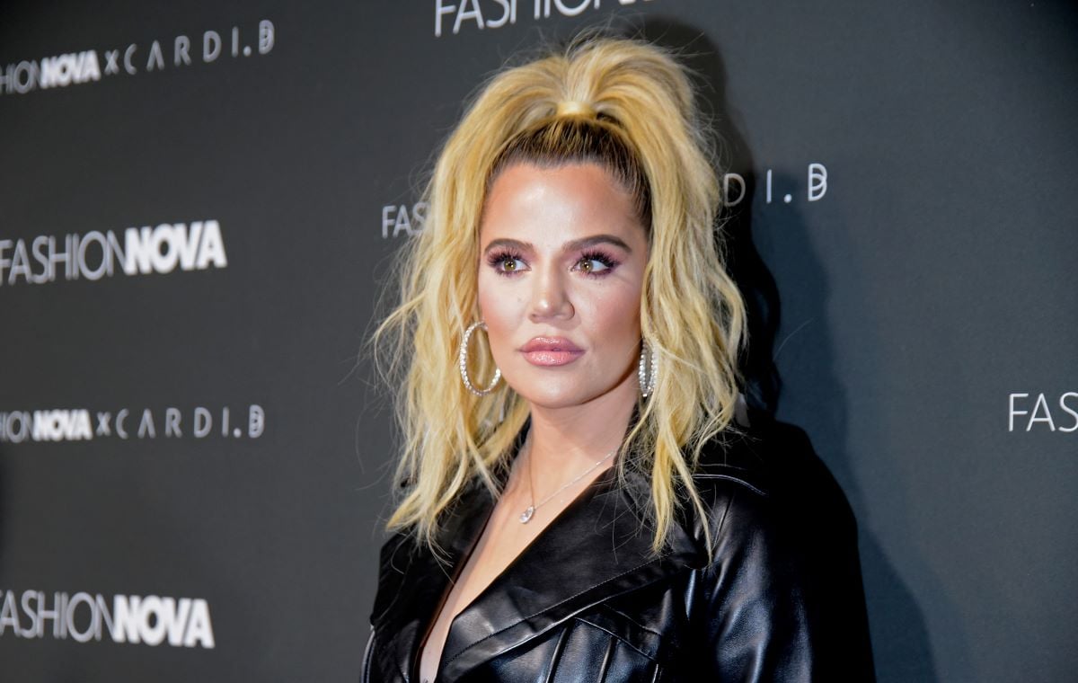 'KUWTK' star Khloe Kardashian in a black leather jacket, wearing a high ponytail