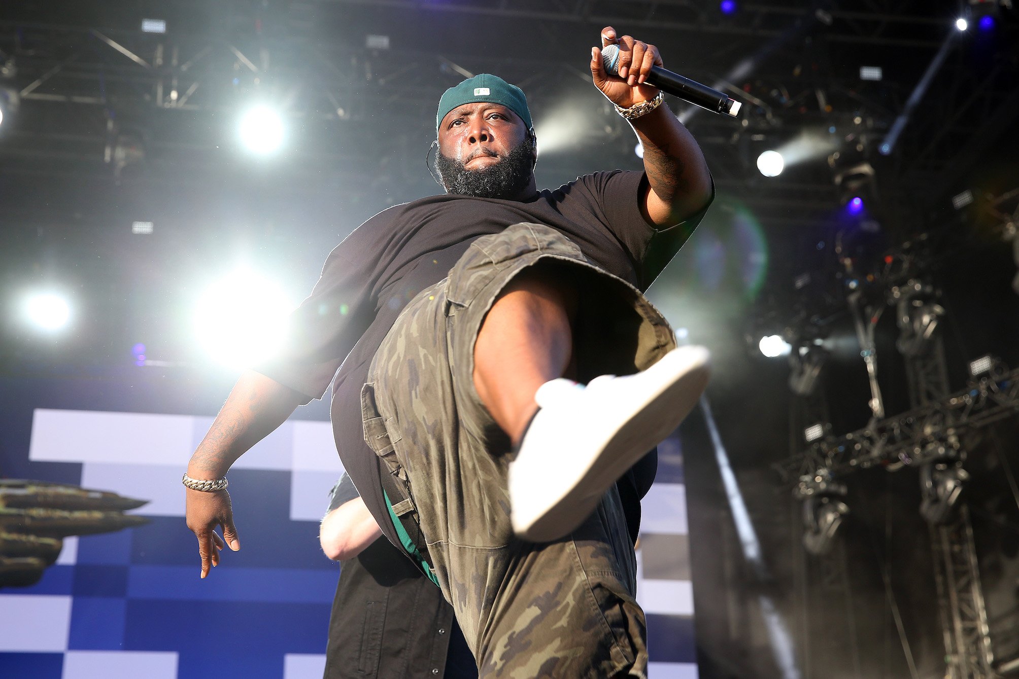 Killer Mike of Run the Jewels on stage performing with one leg lifted. Killer Mike is joining the 'Ozark' Season 4 cast