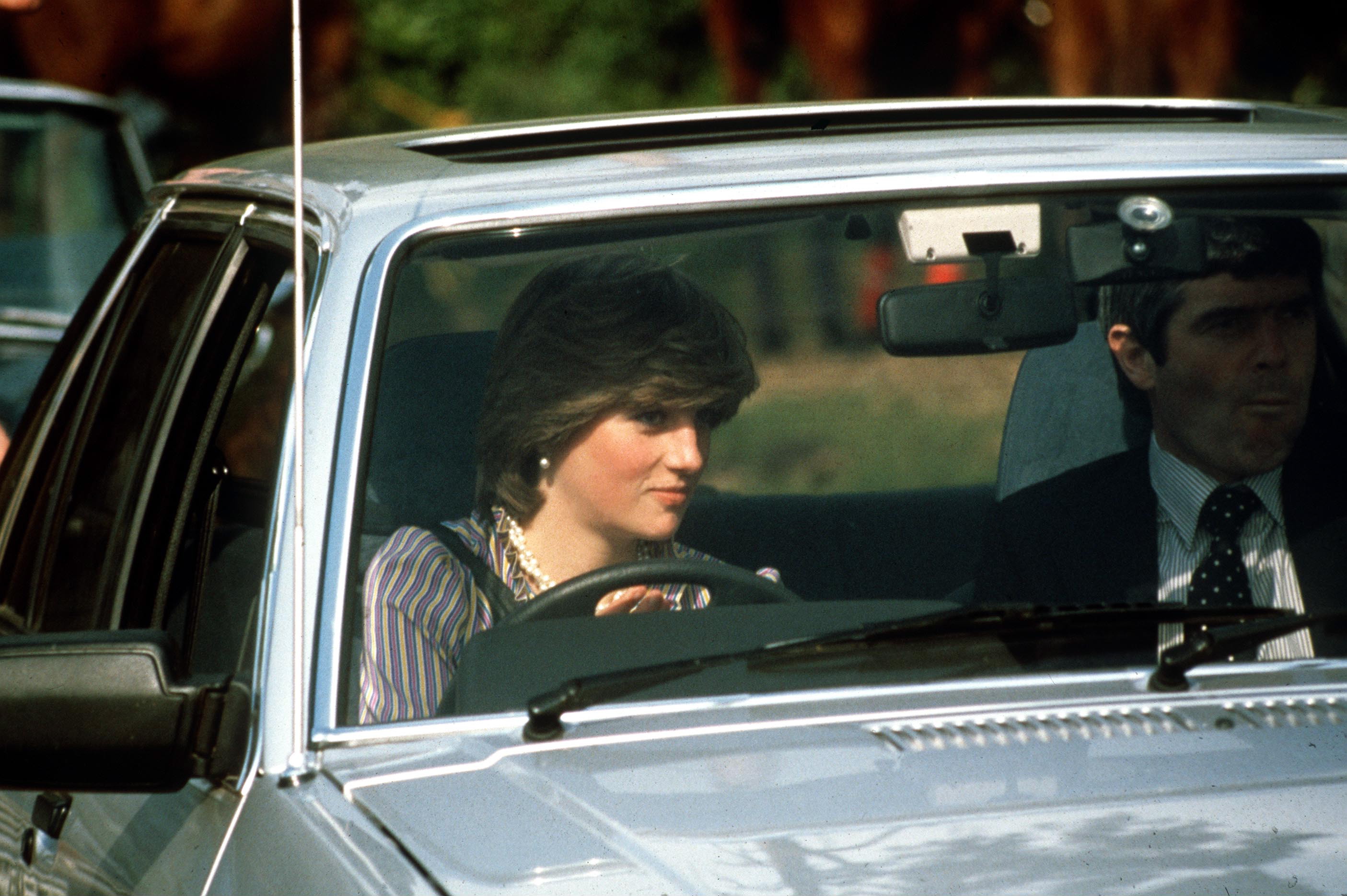 Lady Diana Spencer (Princess Diana) driving her Ford Escort at The Guards Polo Club