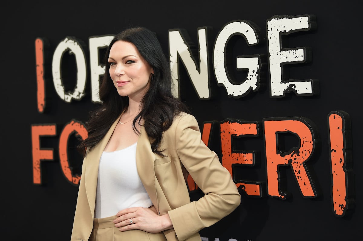 Laura Prepon posing on the red carpet at an event for 'Orange Is the New Black,' on which she played Alex Vause