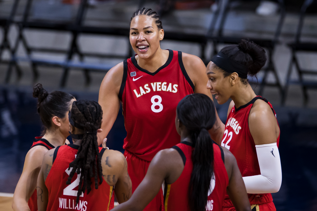 Liz Cambage #8 of the Las Vegas Aces celebrates with teammates during the second half of the game against the Washington Mystics