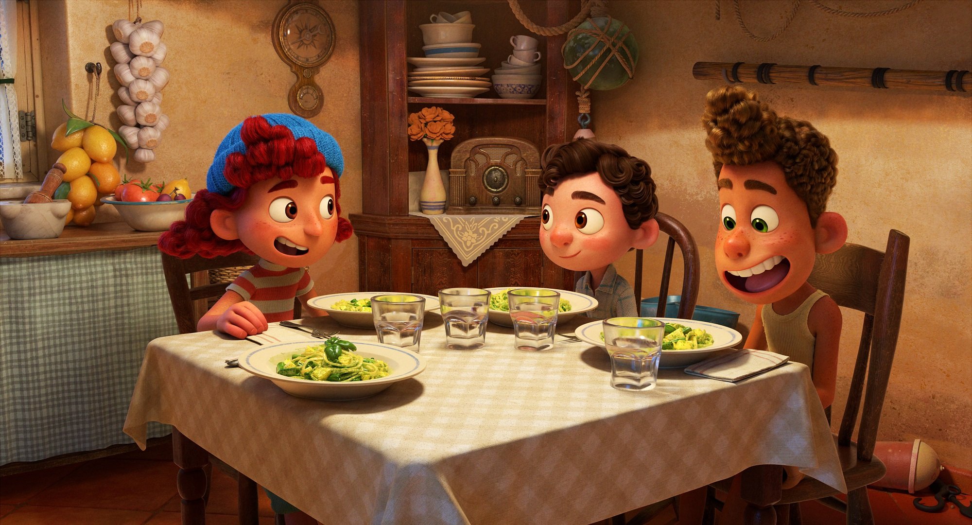 Luca and Alberto have dinner with Giulia in the Luca movie