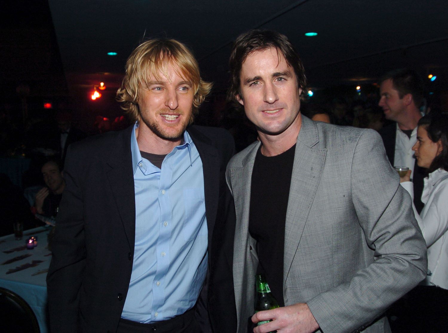 Owen Wilson and Luke Wilson standing together smiling