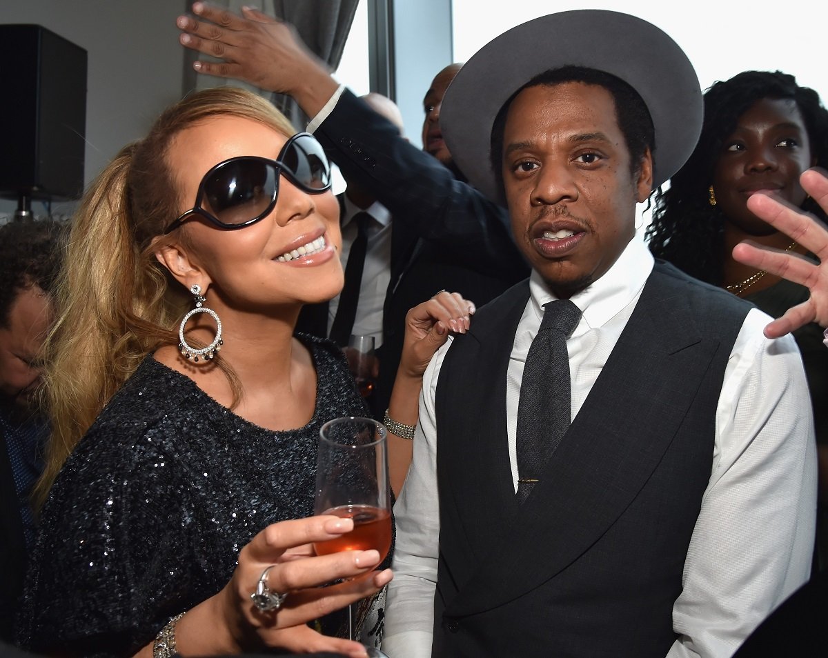 Mariah Carey and Jay-Z pose for a photo together at Roc Nation THE BRUNCH in 2018