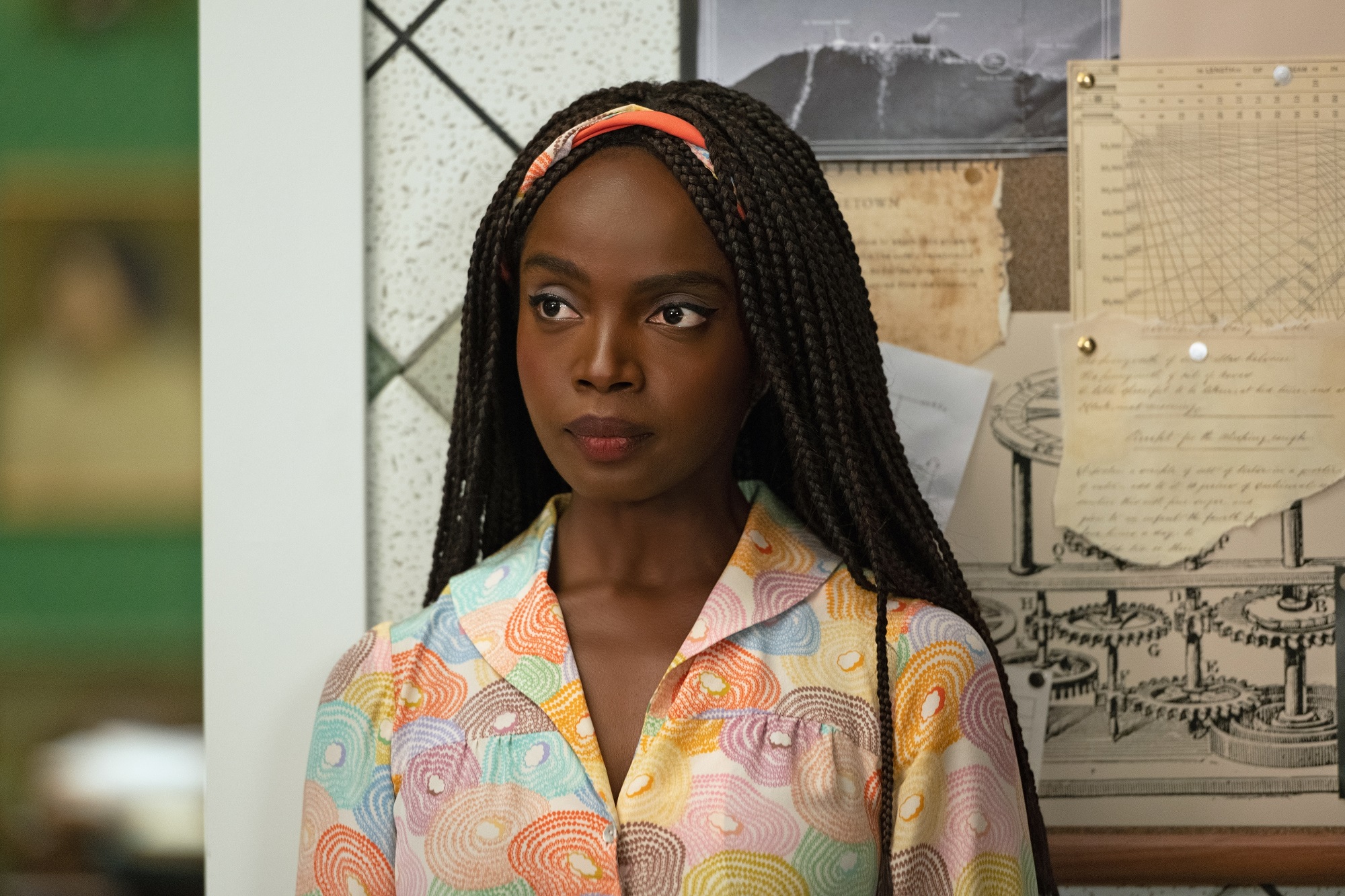 Mysterious Benedict Society: Maameyaa Boafo stands in front of a bulletin board