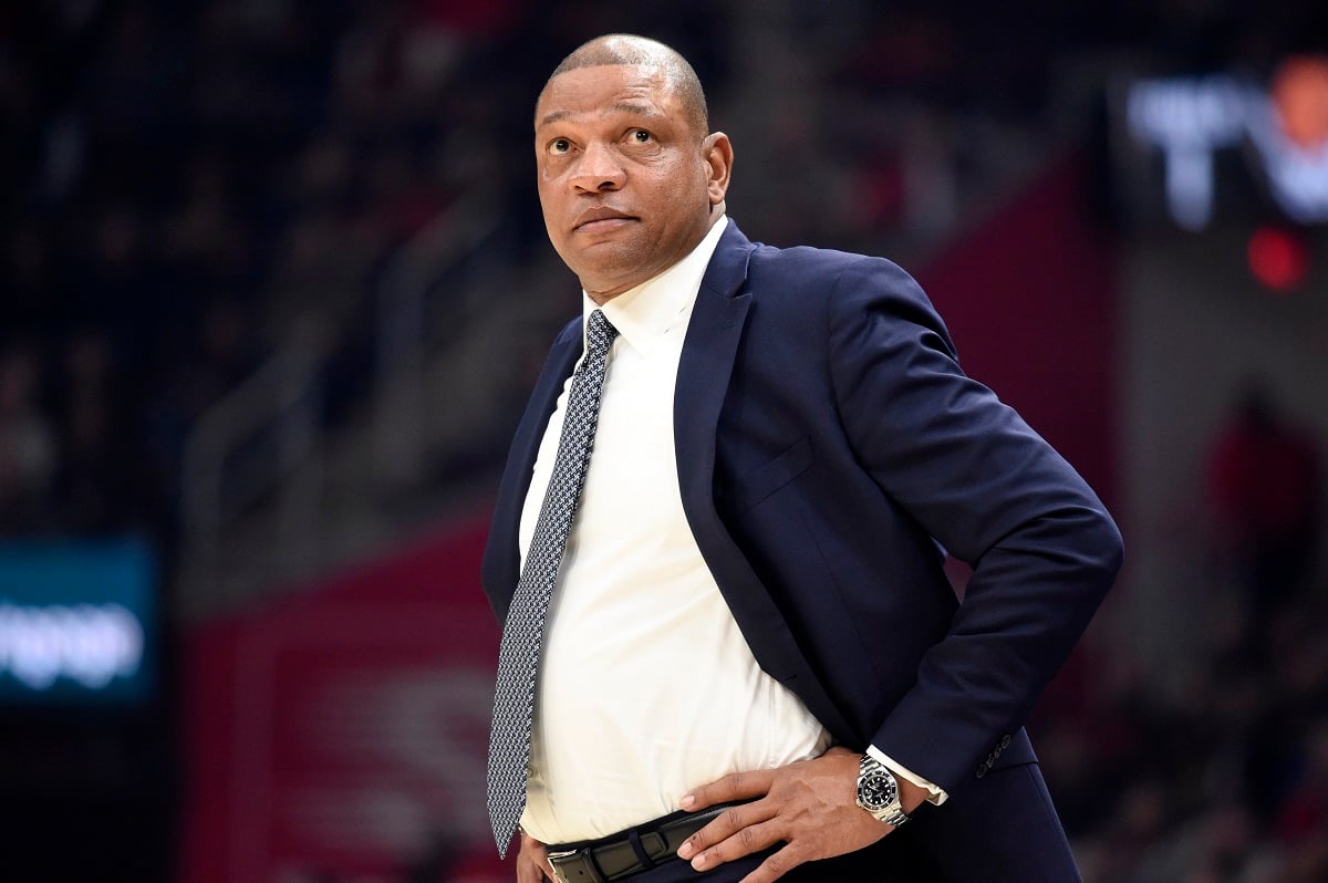 NBA head coach Doc Rivers watching a game from the sidelines