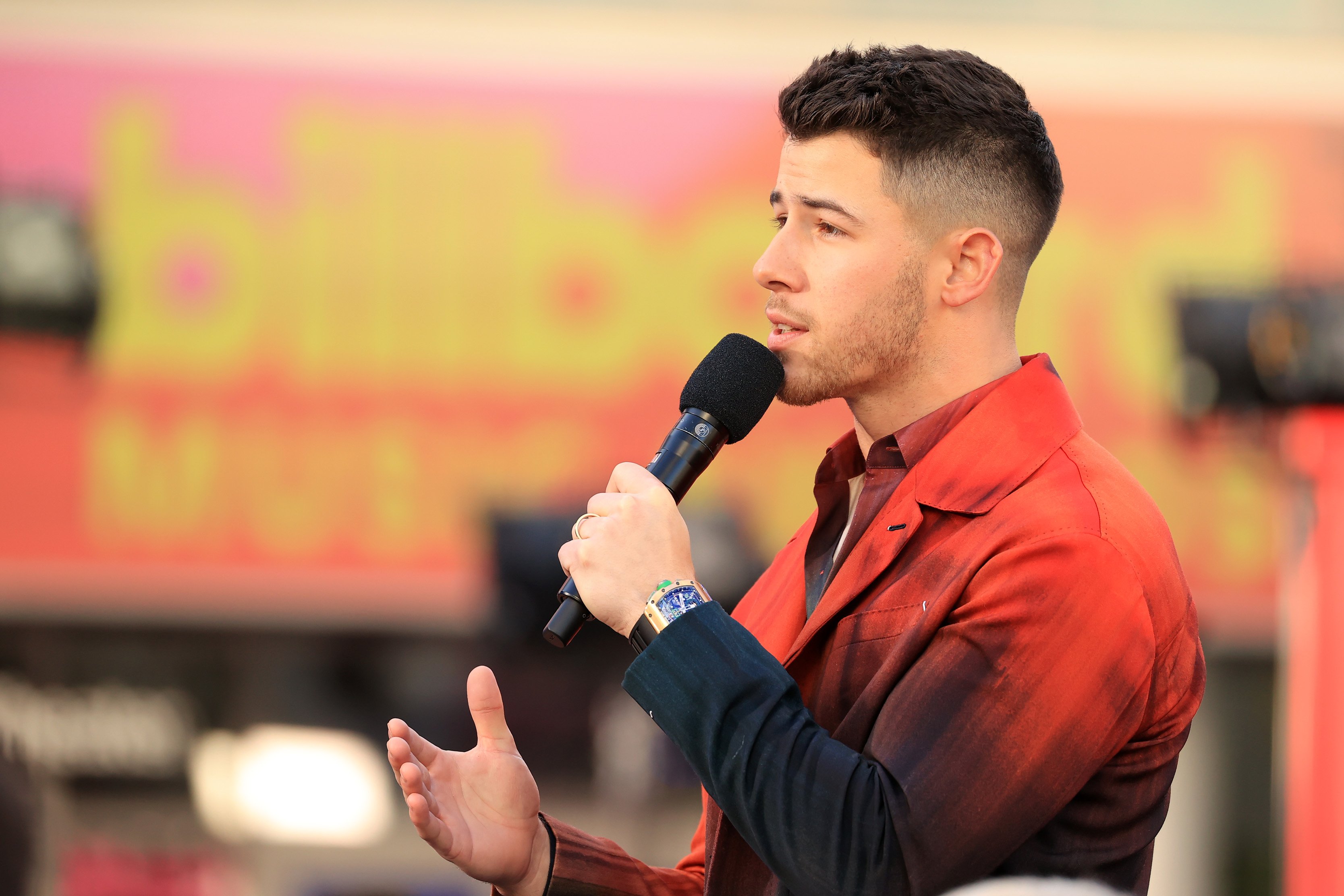 Host Nick Jonas of Jonas Brothers speaks on stage during the 2021 Billboard Music Awards