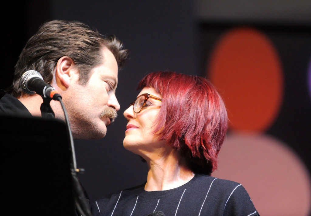 Nick Offerman and Megan Mullally look longingly into each other's eyes.
