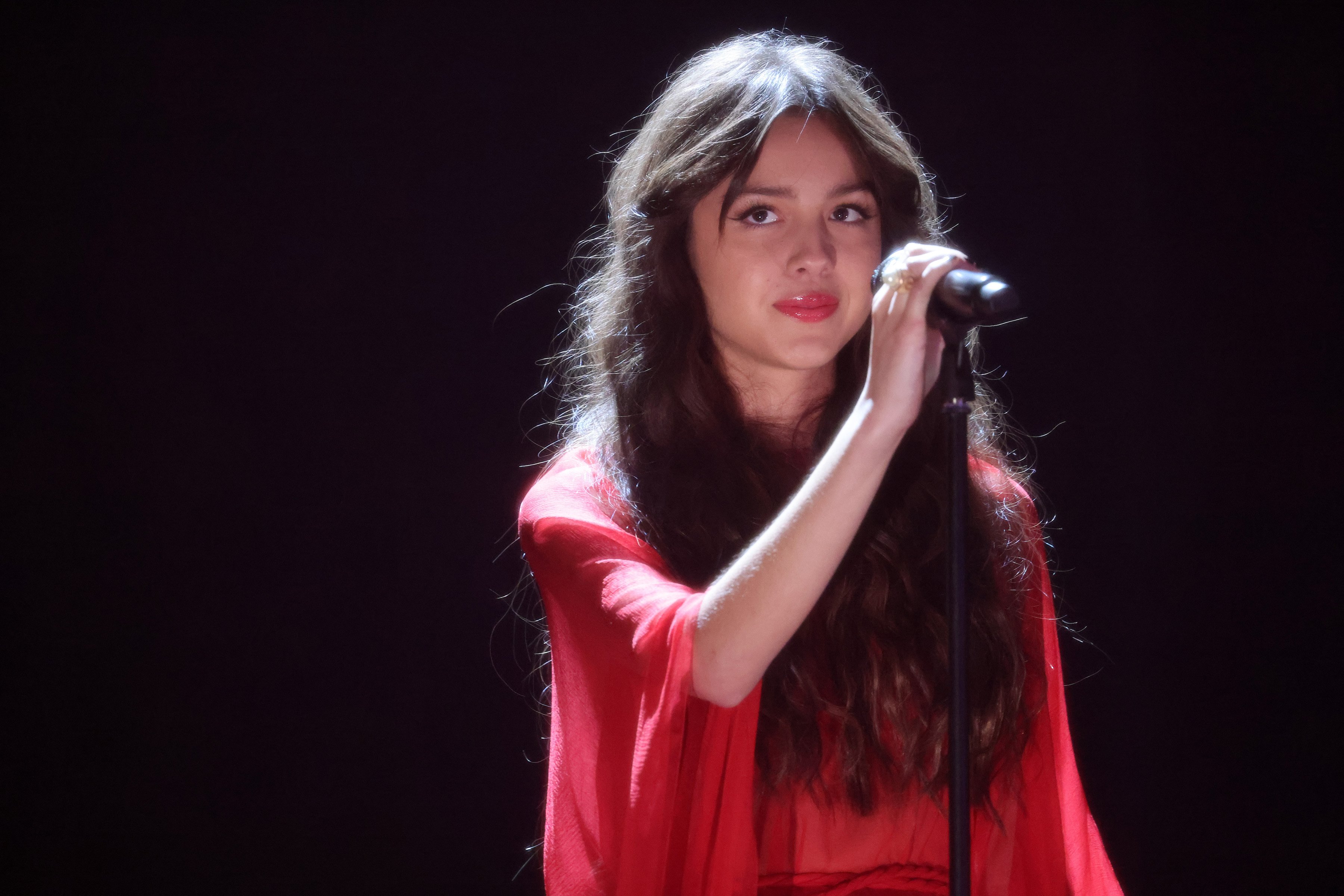 Olivia Rodrigo performed during The BRIT Awards 2021 in a red dress