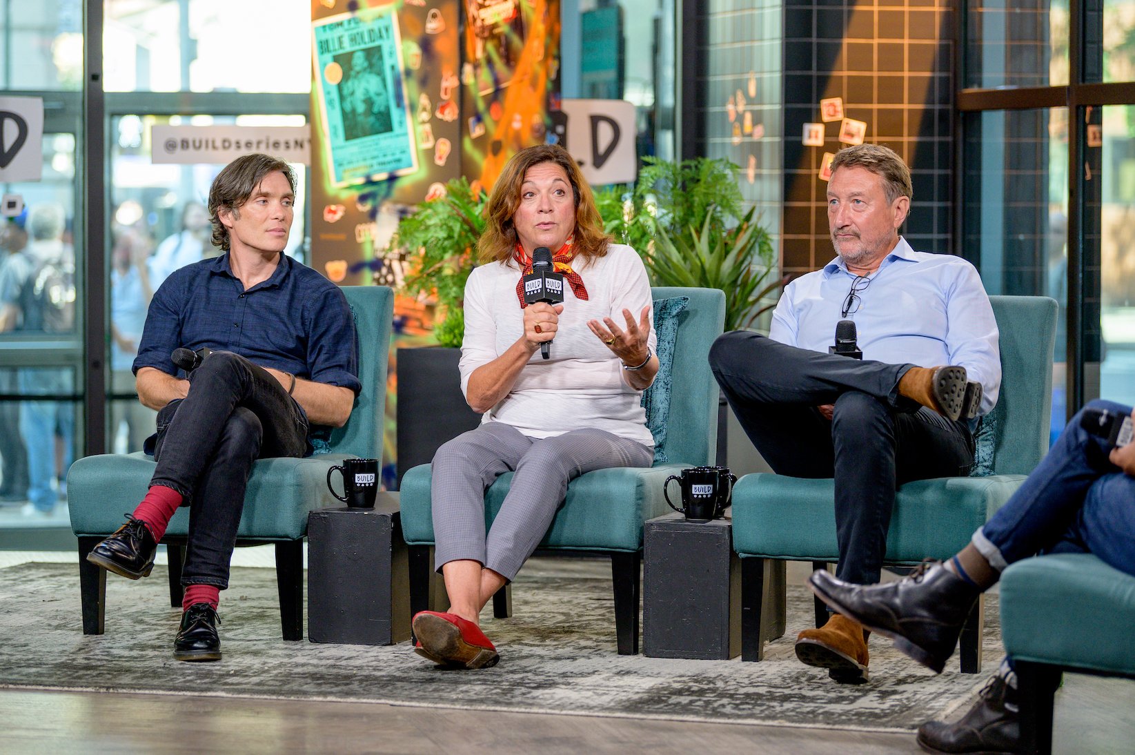 Cillian Murphy, Caryn Mandabach, and Steven Knight sitting together on stage discussing 'Peaky Blinders' Season 6