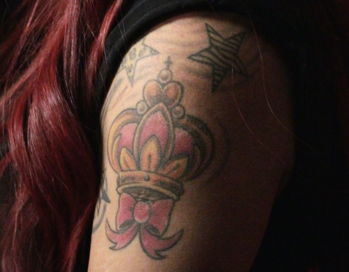 Nicole 'Snooki' Polizzi's tattoo of a bow with a crown on her arm