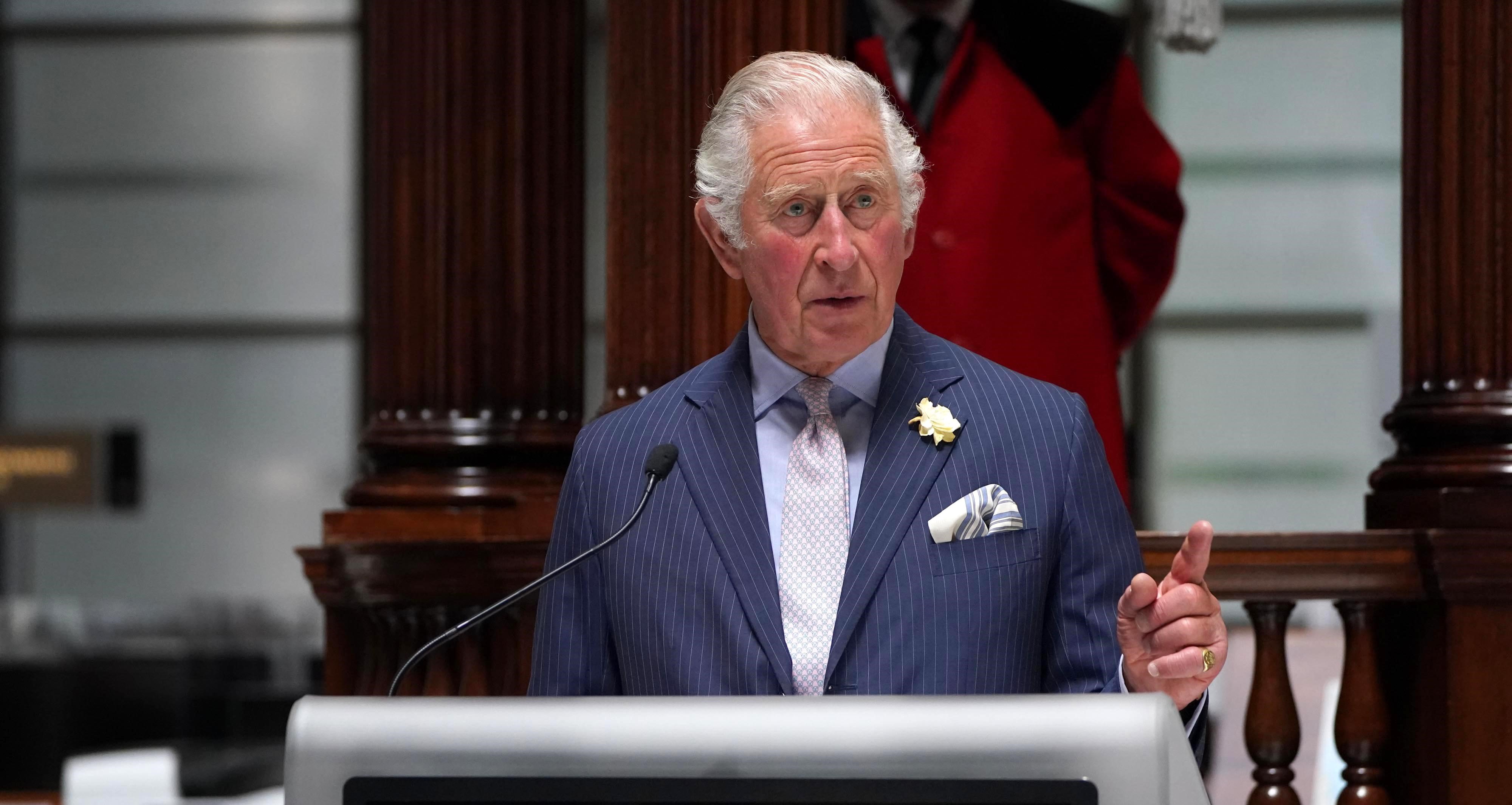 Prince Charles speaking at a podium