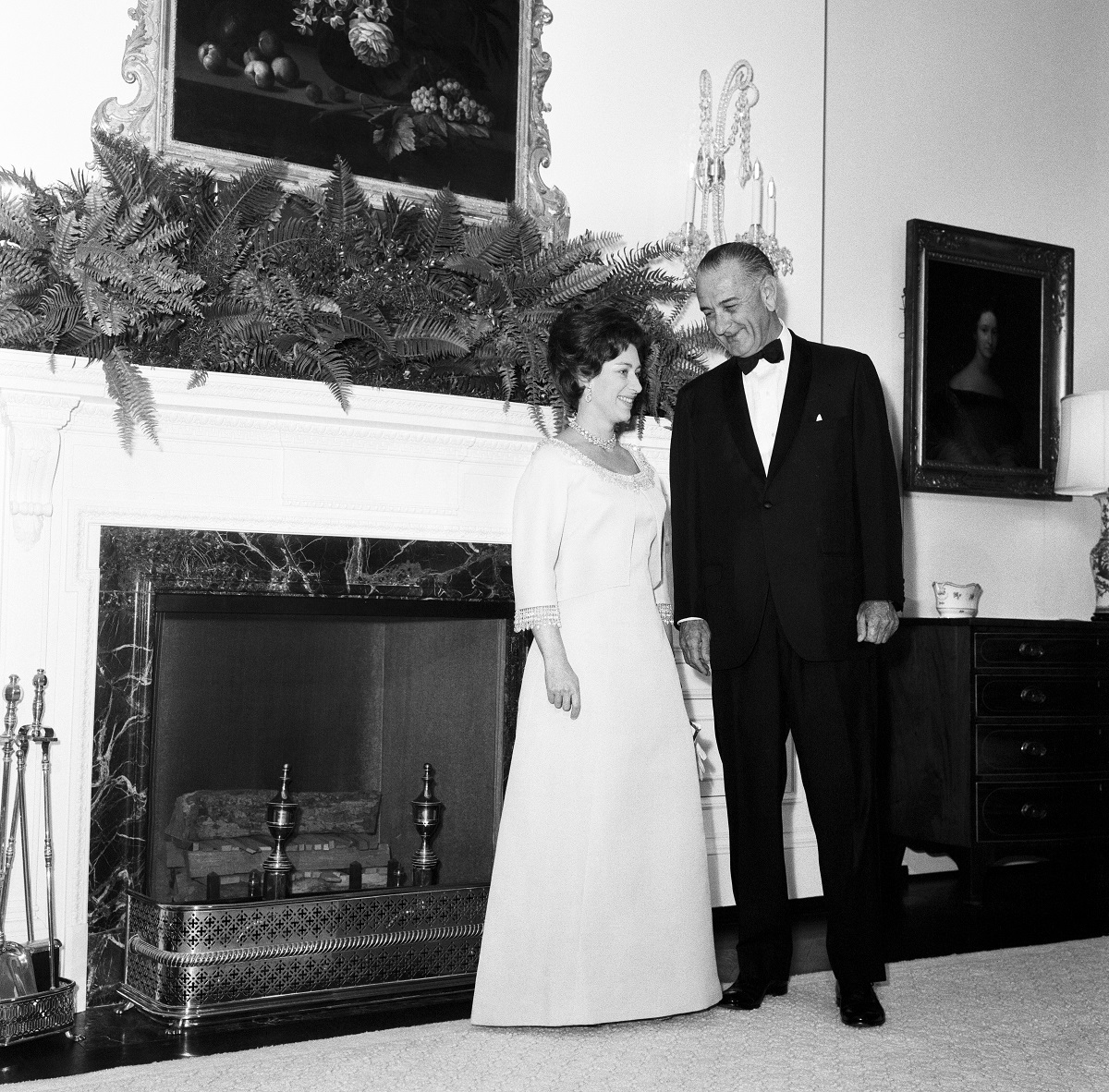 Princess Margaret standing with President Lyndon B. Johnson during a reception at the White House