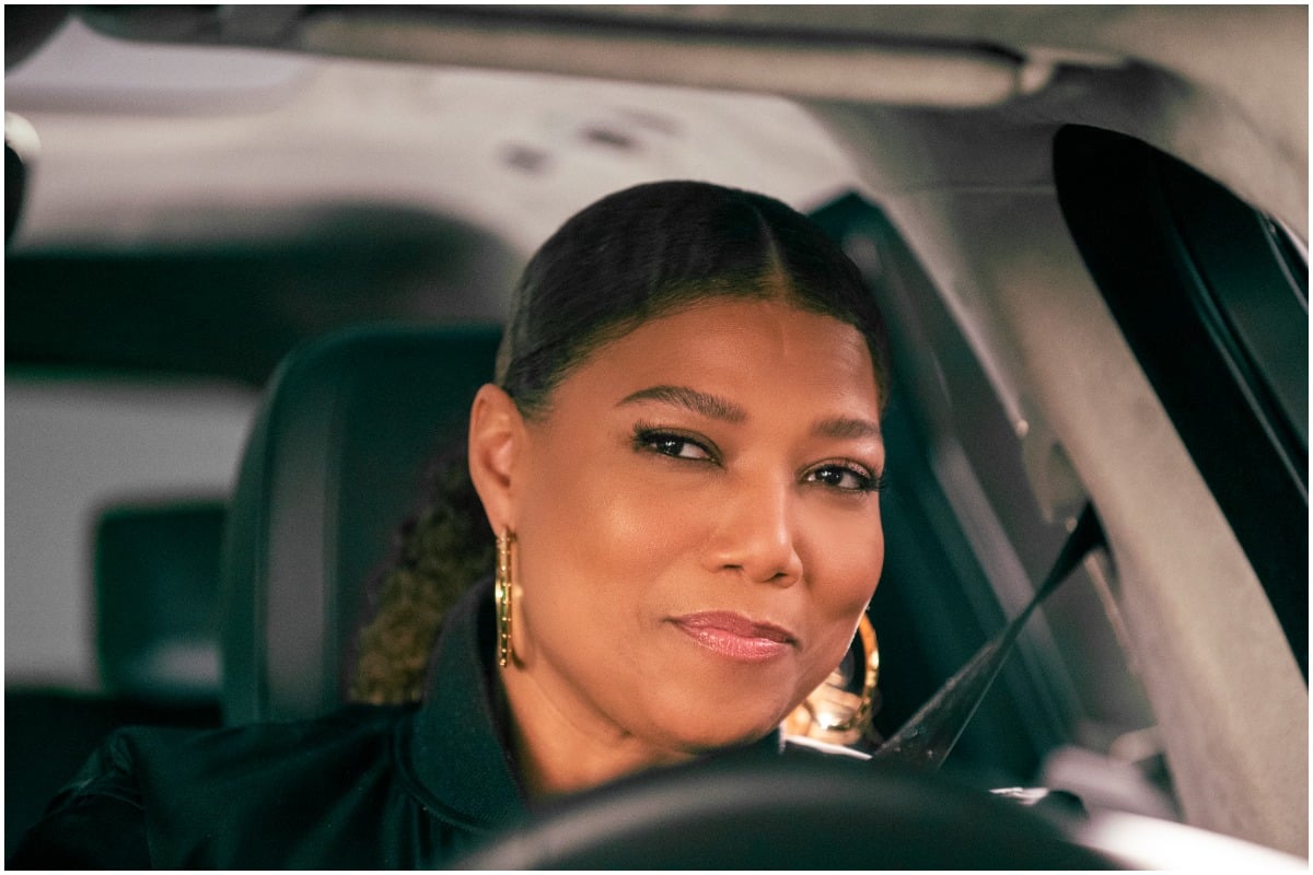 Queen Latifah sits in a car while filming an episode of 'The Equalizer'