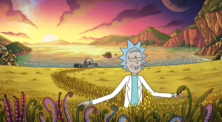 Rick Sanchez of 'Rick and Morty' walks through an idyllic alien field at sunset.